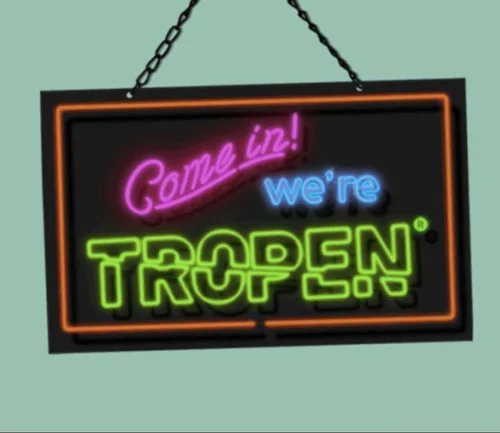 Leuchtreklame mit dem Schriftzug "Come in! we're TROPEN" – das jährliche Get-together